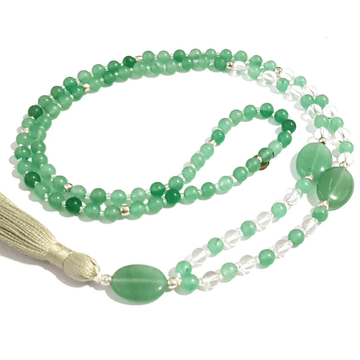 Handmade Good Fortune Mala Necklace – Green Aventurine & Quartz curled on table
